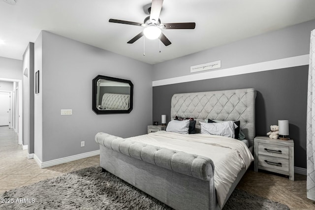 tiled bedroom with ceiling fan