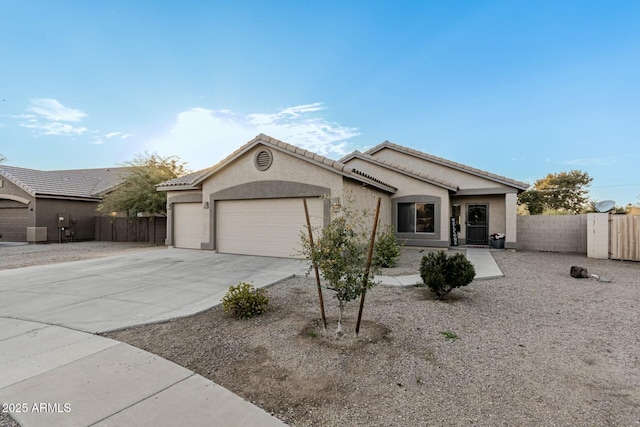 single story home with a garage