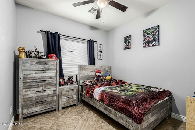 bedroom featuring ceiling fan and light tile patterned floors