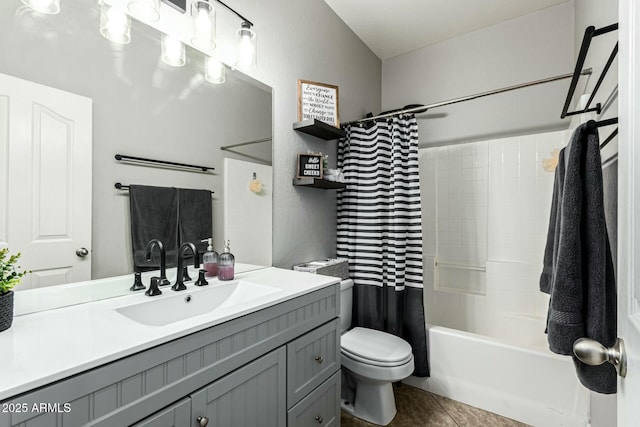 full bathroom featuring tile patterned flooring, shower / bath combination with curtain, vanity, and toilet