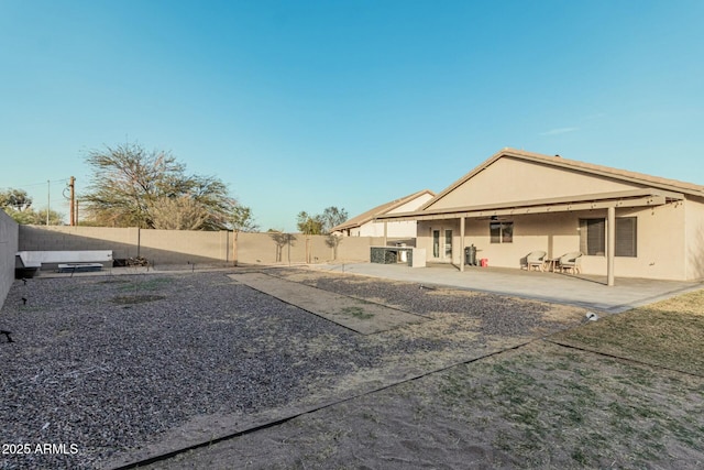 back of house featuring a patio