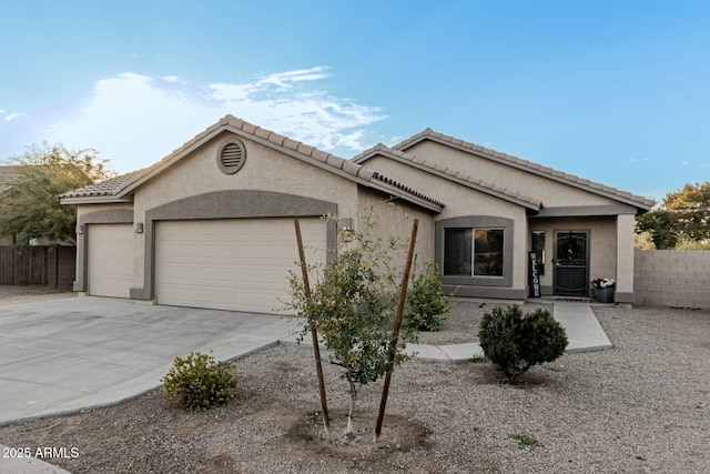 single story home featuring a garage