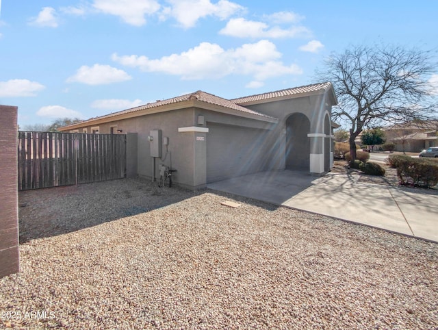 view of home's exterior featuring a patio area