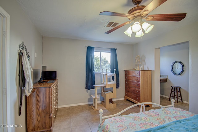 bedroom featuring light tile patterned floors and ceiling fan