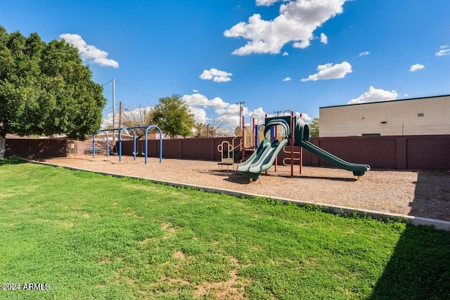 view of play area with a yard