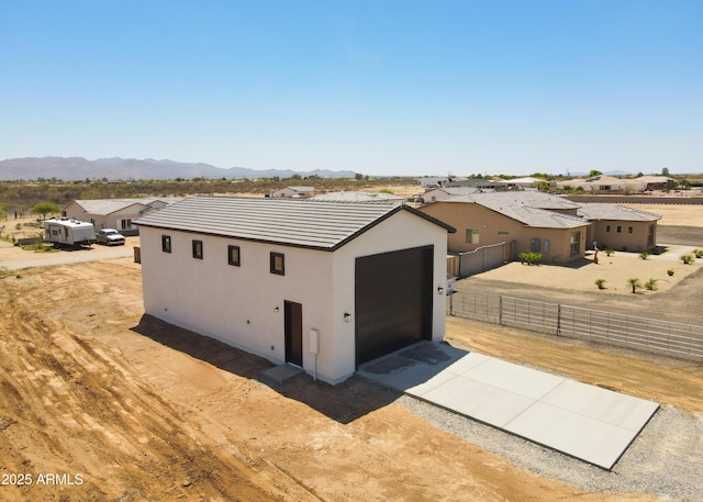 20111 W Saguaro Vista Dr, Wittmann, AZ 85361 - exterior space with a mountain view, driveway, a residential view, and fence