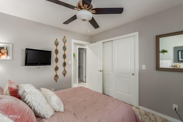 bedroom with a closet and ceiling fan