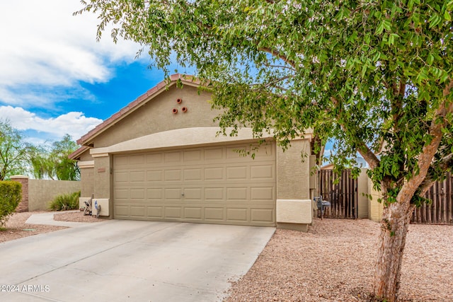 view of front of property with a garage