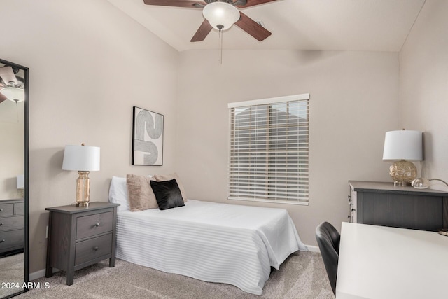 bedroom with ceiling fan, light colored carpet, and lofted ceiling