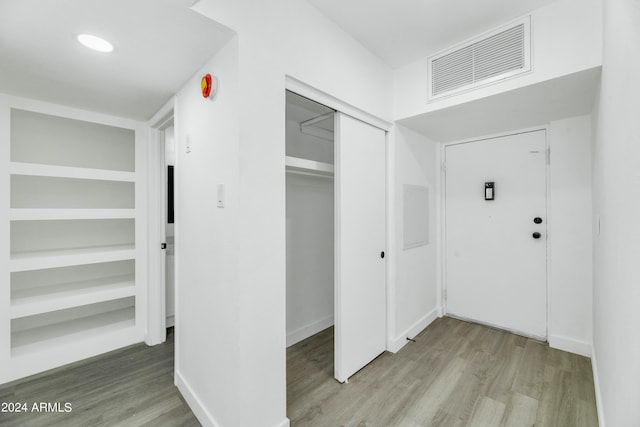 entrance foyer with wood-type flooring