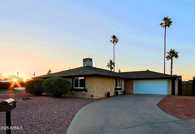 3054 W Redfield Rd, Phoenix, AZ 85053 - ranch-style house with driveway and an attached garage