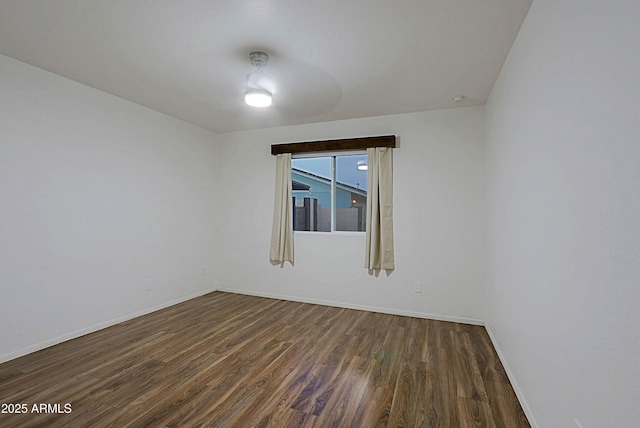 3054 W Redfield Rd, Phoenix, AZ 85053 - empty room with dark wood-style floors and baseboards