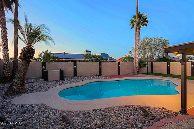 3054 W Redfield Rd, Phoenix, AZ 85053 - pool at dusk featuring a fenced backyard