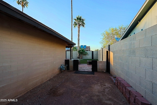 3054 W Redfield Rd, Phoenix, AZ 85053 - view of side of home featuring a gate