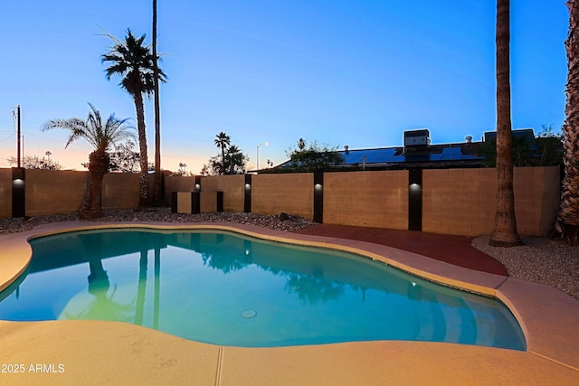 3054 W Redfield Rd, Phoenix, AZ 85053 - pool at dusk featuring a fenced backyard