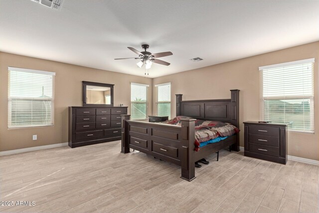 bedroom featuring ceiling fan and light hardwood / wood-style floors