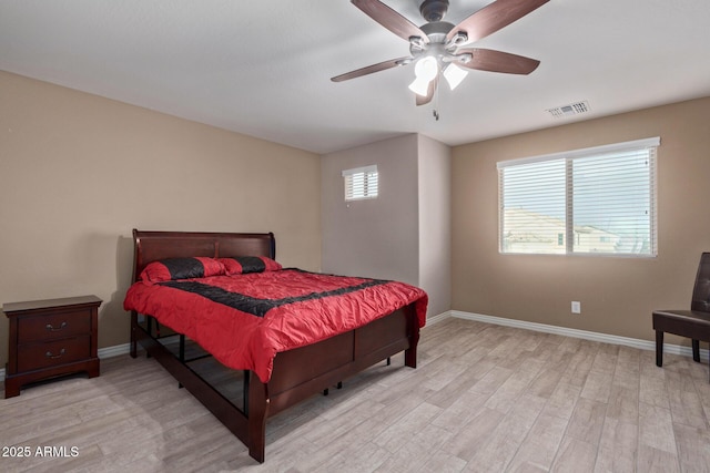 bedroom featuring ceiling fan and light hardwood / wood-style floors