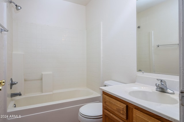 full bathroom featuring shower / bathing tub combination, vanity, and toilet