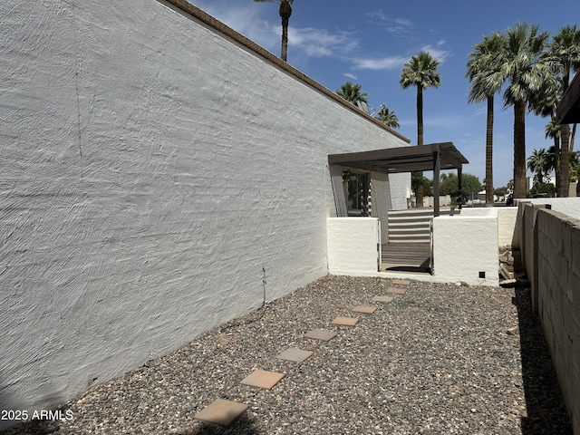 220 S Old Litchfield Rd Unit 104, Litchfield Park, AZ 85340 - view of home's exterior featuring stucco siding