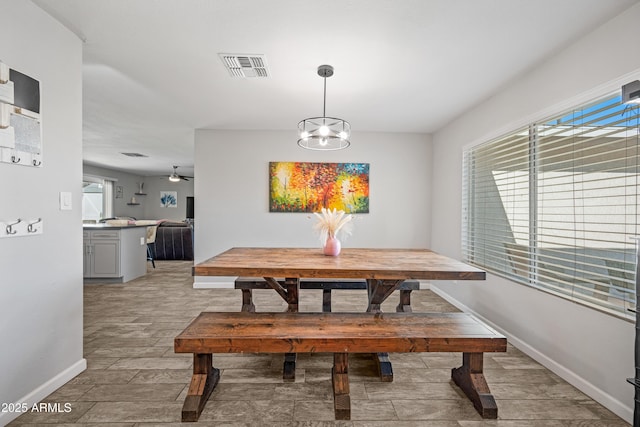 dining area featuring a wealth of natural light and ceiling fan