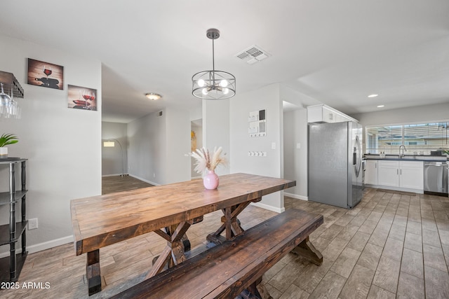 dining space with sink