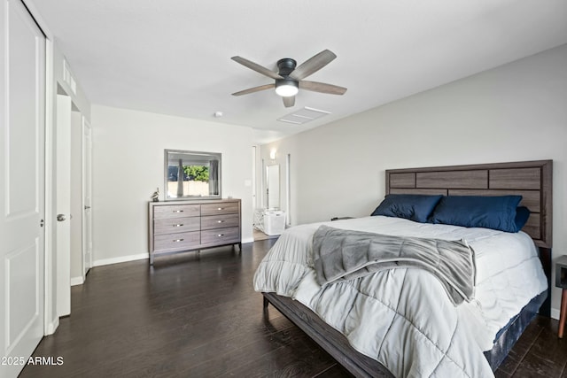 bedroom featuring dark hardwood / wood-style flooring and ceiling fan