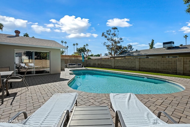 view of pool featuring a patio