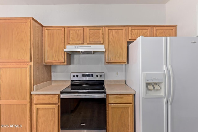 2590 S Buckaroo Trl, Gilbert, AZ 85295 - kitchen featuring white fridge with ice dispenser, under cabinet range hood, stainless steel electric range oven, and light countertops