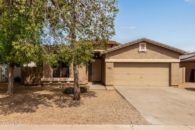 2590 S Buckaroo Trl, Gilbert, AZ 85295 - view of front of home featuring stucco siding, an attached garage, concrete driveway, and a tile roof
