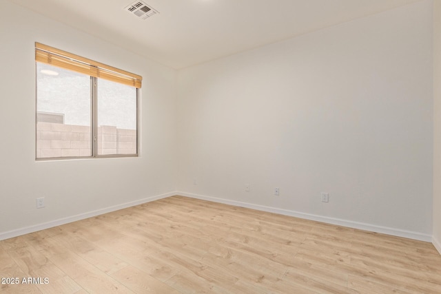 2590 S Buckaroo Trl, Gilbert, AZ 85295 - empty room with light wood finished floors and baseboards
