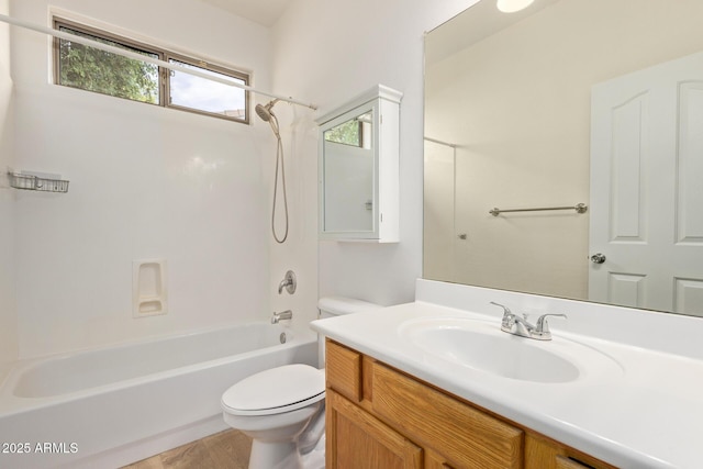2590 S Buckaroo Trl, Gilbert, AZ 85295 - bathroom with toilet, vanity, and shower / washtub combination