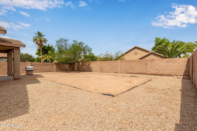 2590 S Buckaroo Trl, Gilbert, AZ 85295 - fenced backyard with a patio area
