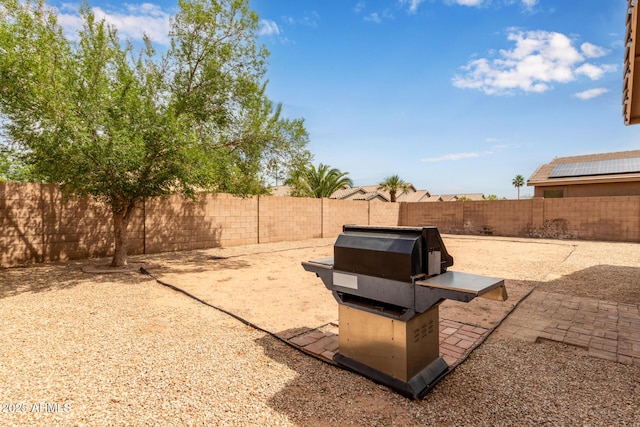 2590 S Buckaroo Trl, Gilbert, AZ 85295 - fenced backyard featuring a patio area
