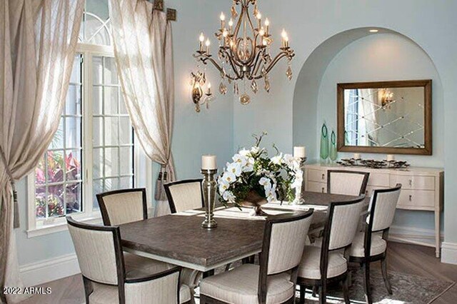 dining area featuring dark hardwood / wood-style flooring