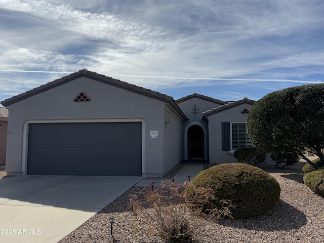 ranch-style house featuring a garage