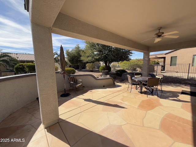 view of patio with ceiling fan