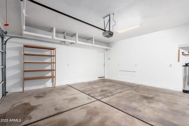 34516 S Pioneer Way, Red Rock, AZ 85145 - garage with a garage door opener and water heater