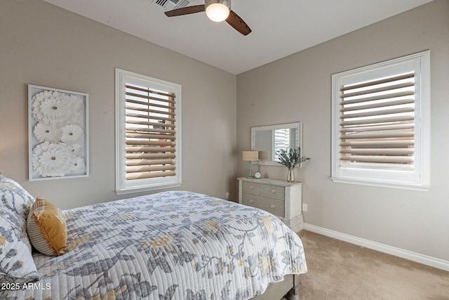 bedroom with carpet flooring, baseboards, and ceiling fan