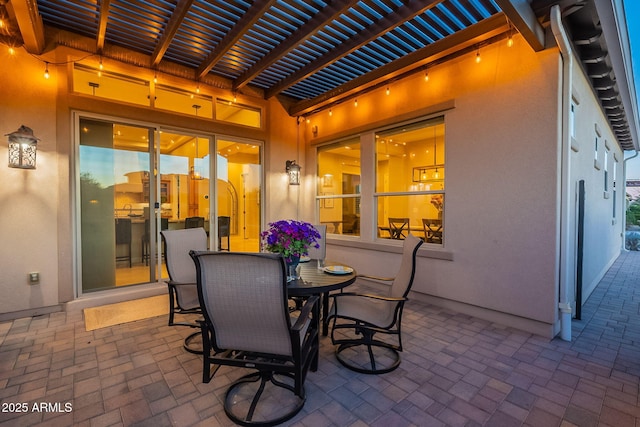 view of patio / terrace featuring outdoor dining space and a pergola