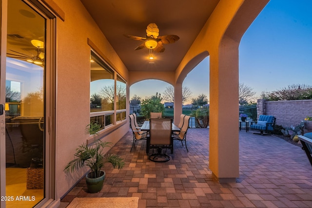 view of patio / terrace featuring outdoor dining space and fence