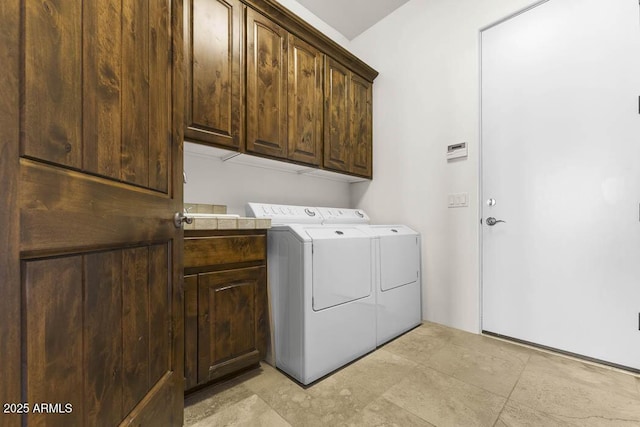 laundry room featuring cabinet space and independent washer and dryer