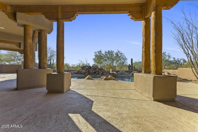 view of patio / terrace featuring an outdoor pool