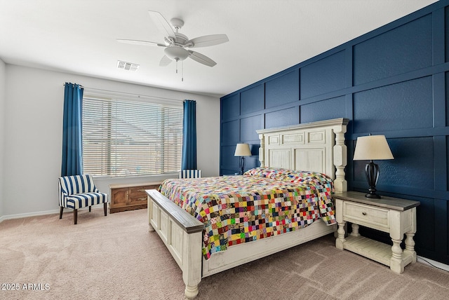 bedroom featuring visible vents, a ceiling fan, baseboards, and light carpet