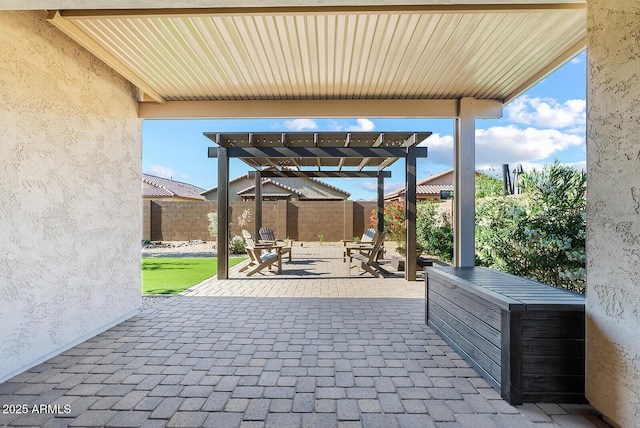 view of patio featuring a pergola and a fenced backyard