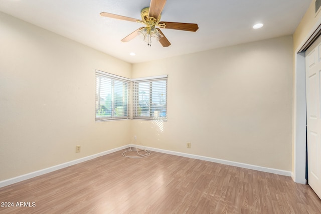 unfurnished bedroom featuring ceiling fan and light wood-type flooring