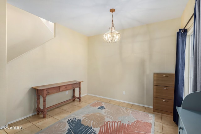 interior space featuring light tile patterned floors and a notable chandelier