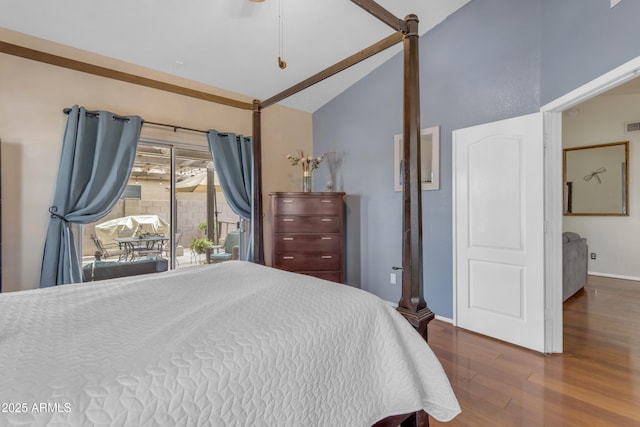 bedroom featuring access to exterior, vaulted ceiling, ceiling fan, and wood-type flooring