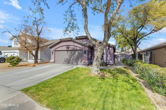 view of front of house featuring a front yard and a garage