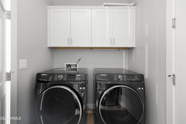 6450 E Vernon Ave, Scottsdale, AZ 85257 - laundry room featuring independent washer and dryer and cabinet space