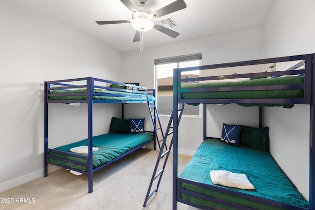 6450 E Vernon Ave, Scottsdale, AZ 85257 - carpeted bedroom featuring baseboards and a ceiling fan